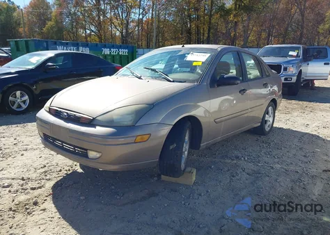 2003 Ford Focus Zts z USA, uszkodzony, nr VIN 1FAHP38353W308416